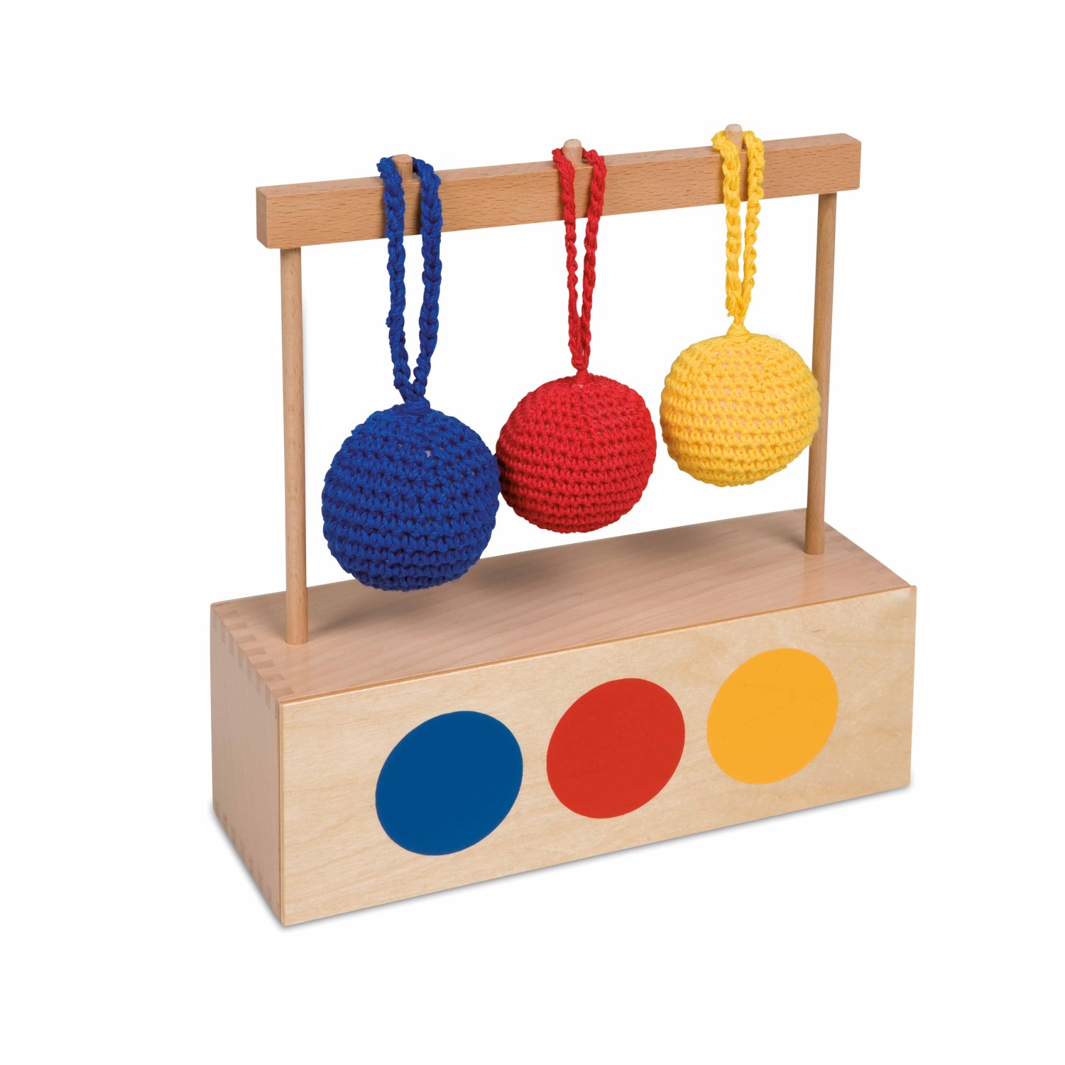 Imbucare-Kasten mit drei gestrickten Bällen